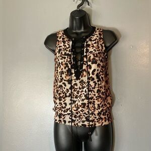 BEBE animal print sheer lace up blouse